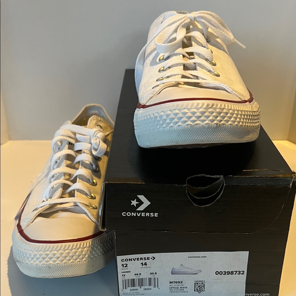 Converse White Athletic Shoes with Red Accents.